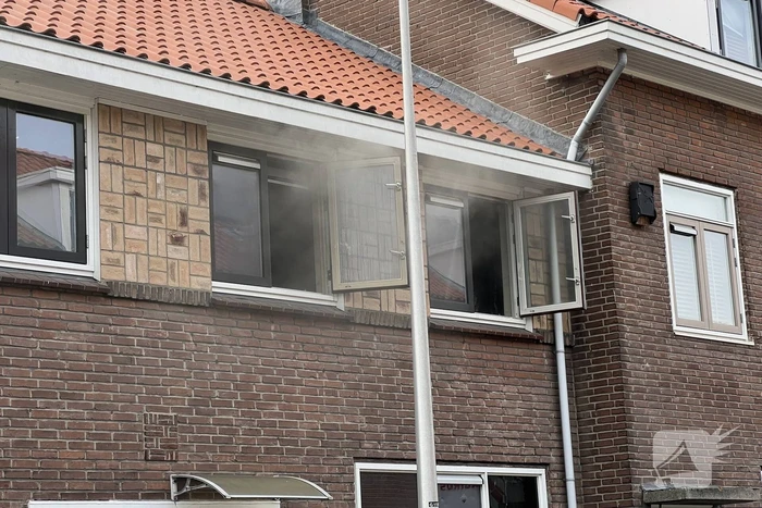 Woning flink beschadigd door brand