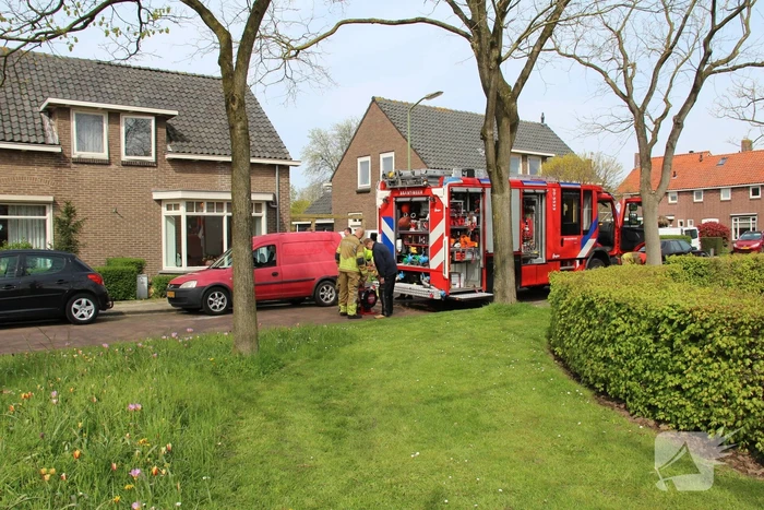 Brand in garage door sleutelen aan auto