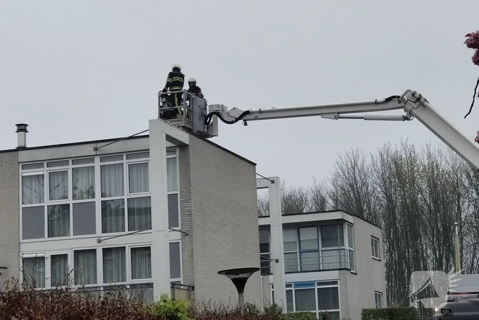Schoorsteen geveegd na brand