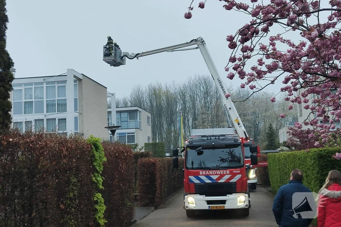 Schoorsteen geveegd na brand