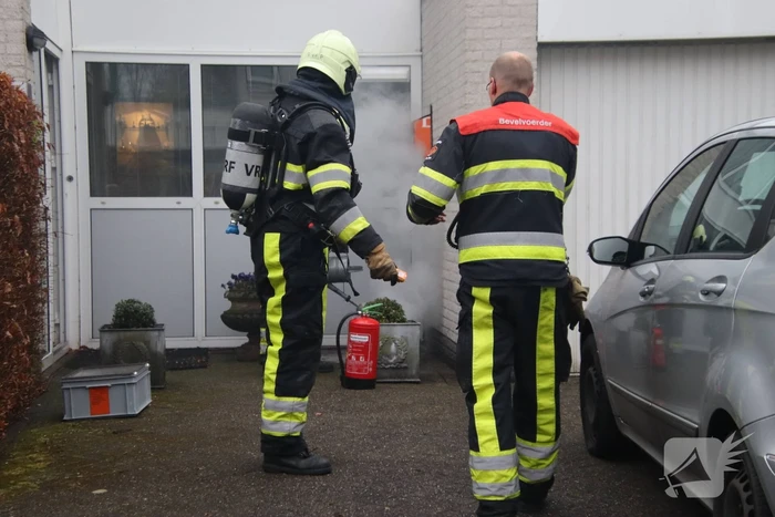 Schoorsteen geveegd na brand
