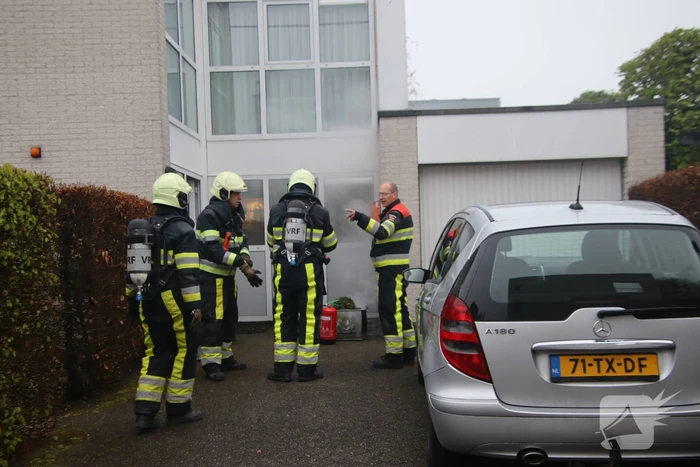 Schoorsteen geveegd na brand