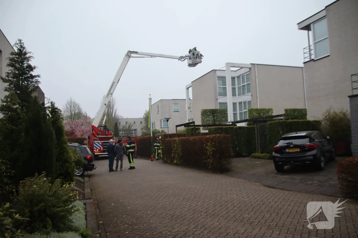 Schoorsteen geveegd na brand
