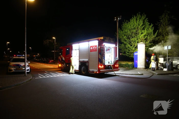 Auto en container in brand gestoken