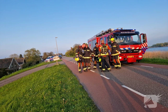 Brand in rietenkap van woning