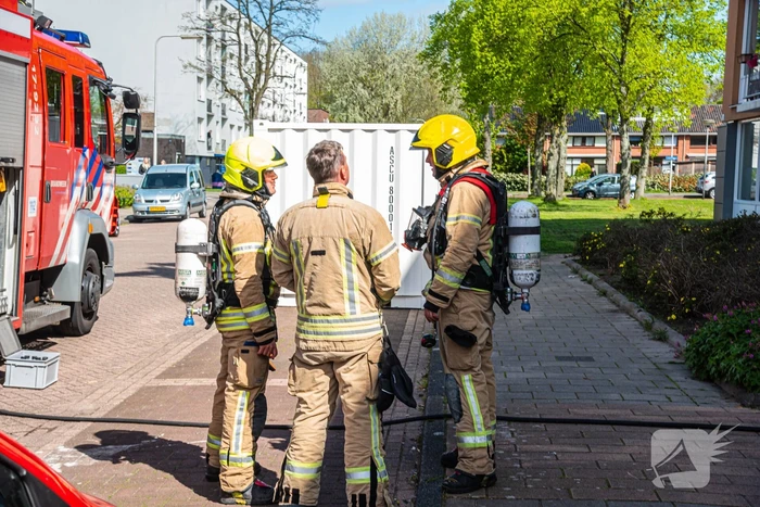 Brand in slaapkamer van portiekwoning