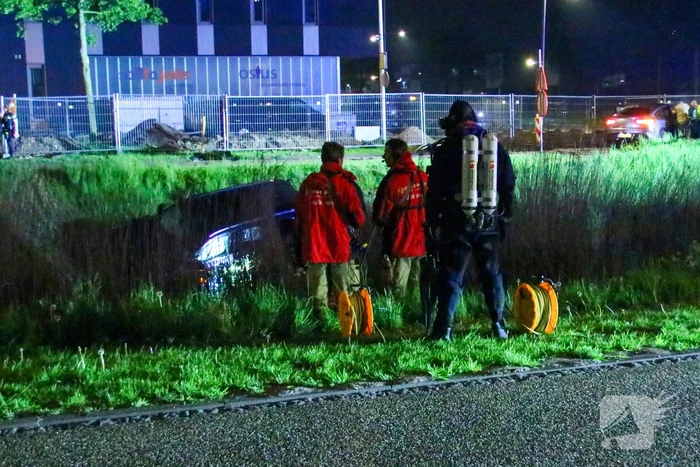 Voertuig te water na aanrijding