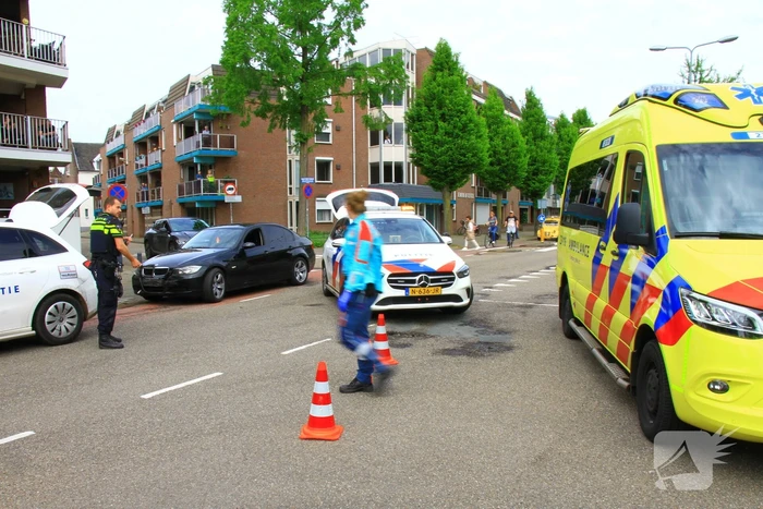 Schade na botsing op kruising