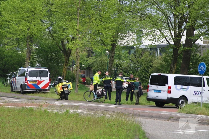 Fietsster aangereden door taxi bus