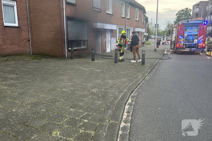 Veel rook bij brand in woning