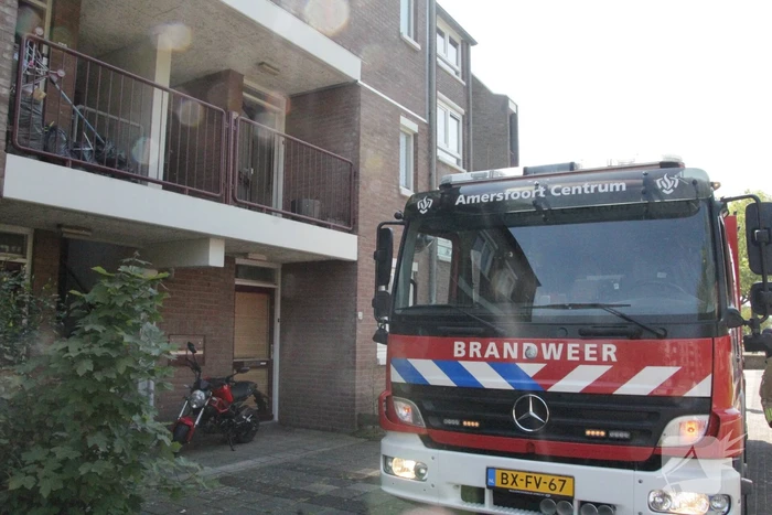 Pan op kookplaat vat vlam