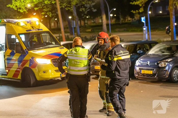 Gezin van balkon gered na brand