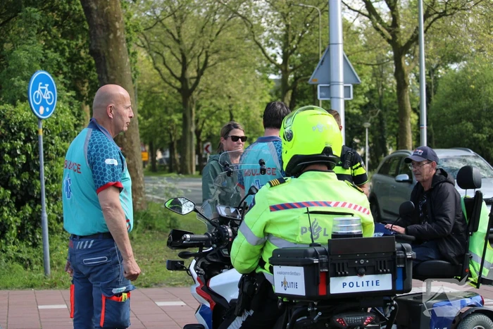 Scootmobieler omgeslagen na aanrijding met auto
