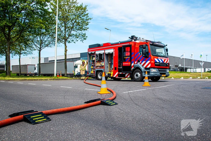 Brand in perscontainer met papier
