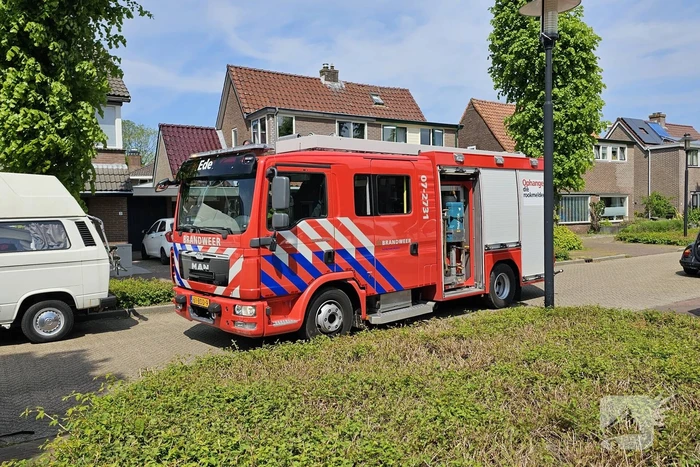 Pergola vat vlam in tuin van woning