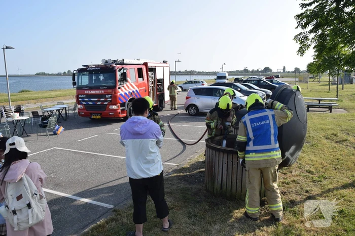 Container in brand door BBQ