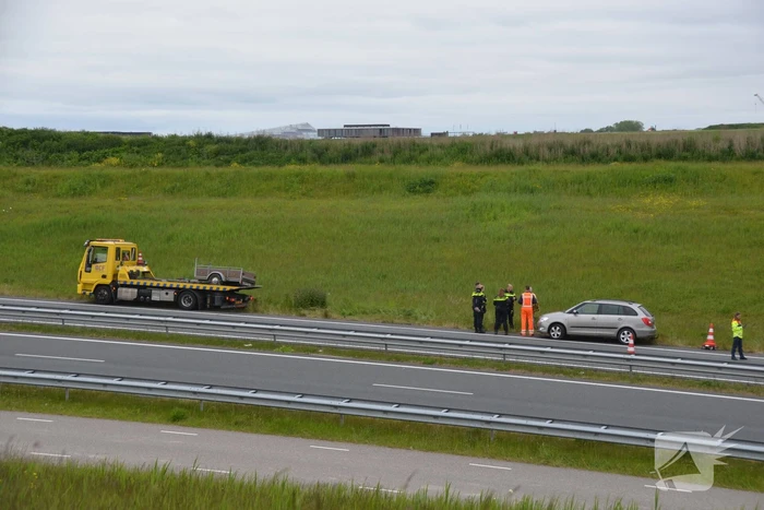 Auto met aanhanger geschaard