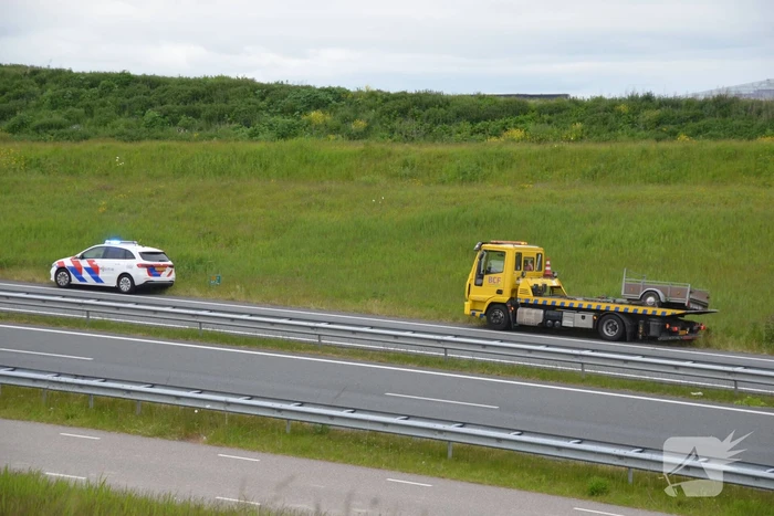 Auto met aanhanger geschaard