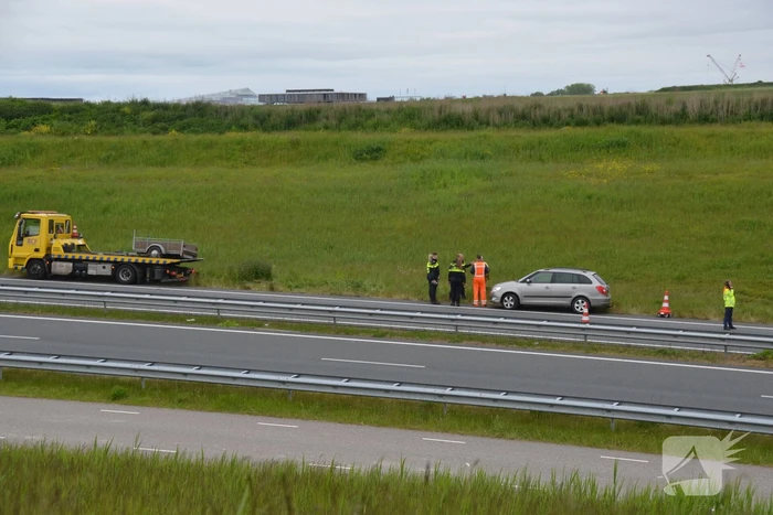 Auto met aanhanger geschaard