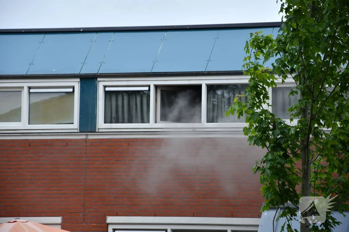 Hevige rookontwikkeling bij uitslaande brand