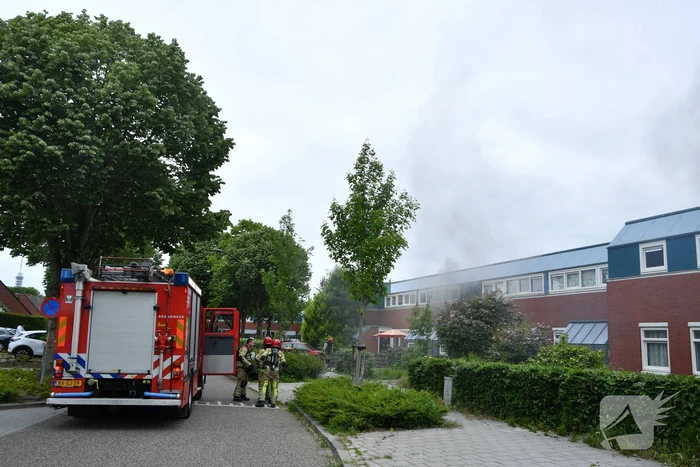 Hevige rookontwikkeling bij uitslaande brand