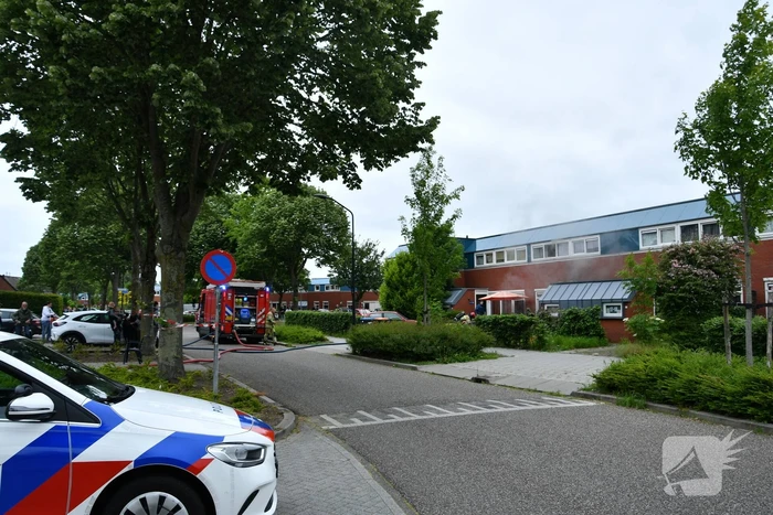 Hevige rookontwikkeling bij uitslaande brand