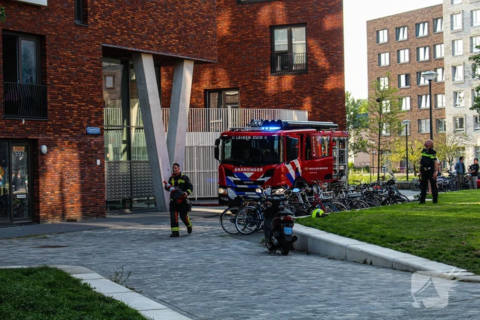 Brand in woning op achtste etage