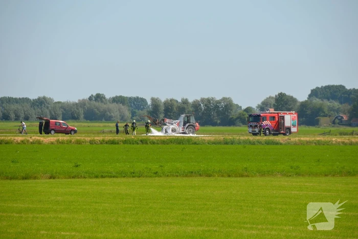 Brandweer blust brandende verrijker