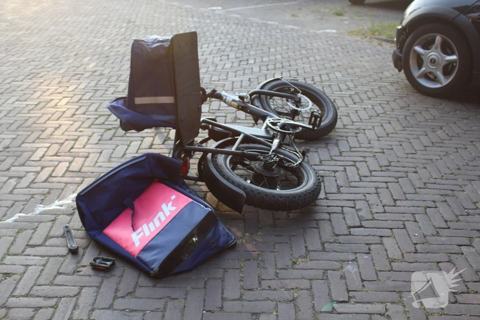 Flitsbezorger gewond bij aanrijding