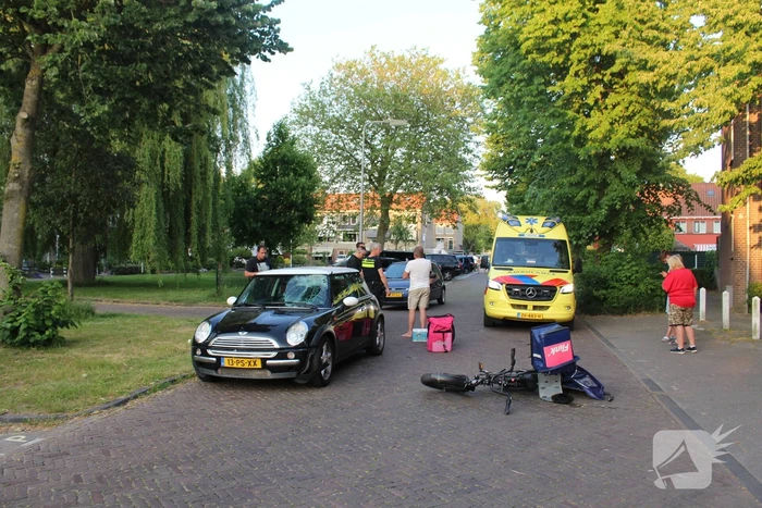 Flitsbezorger gewond bij aanrijding