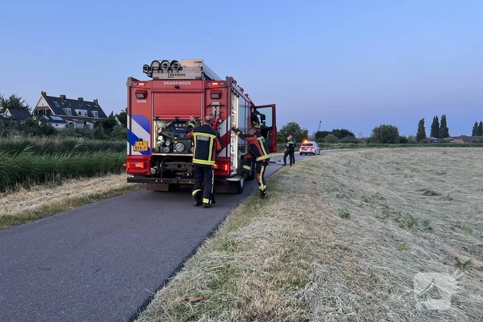 Afval in brand snel geblust