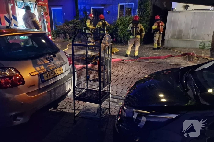 Buurman ontdekt brand in woning