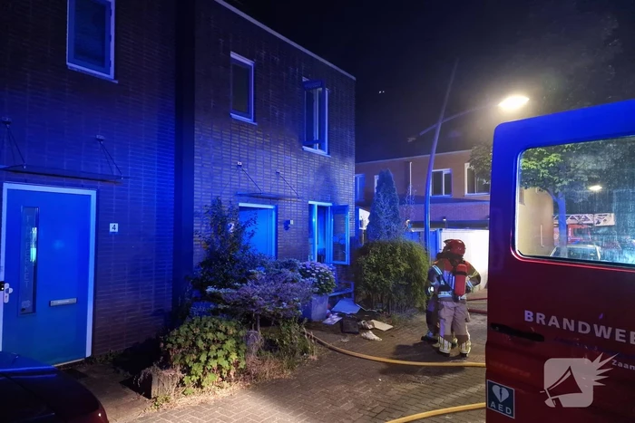 Buurman ontdekt brand in woning