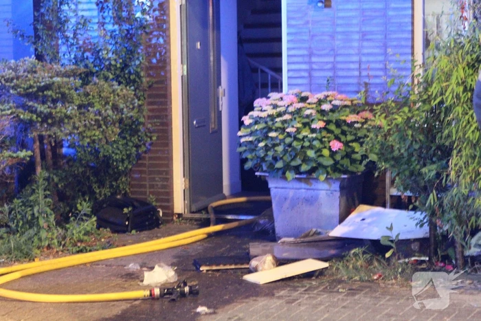 Buurman ontdekt brand in woning