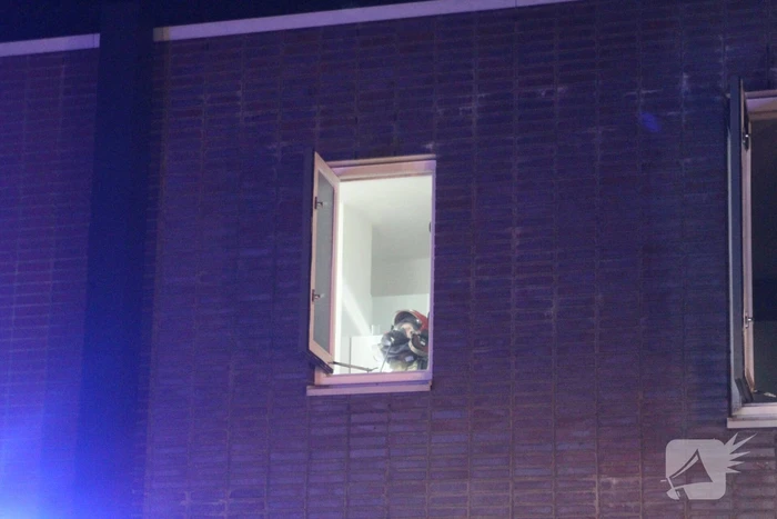 Buurman ontdekt brand in woning