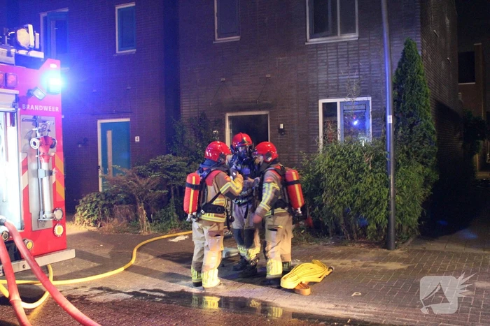 Buurman ontdekt brand in woning