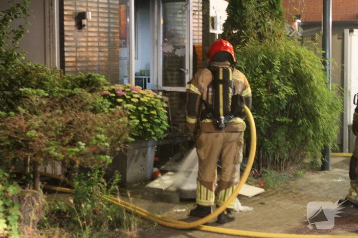 Buurman ontdekt brand in woning