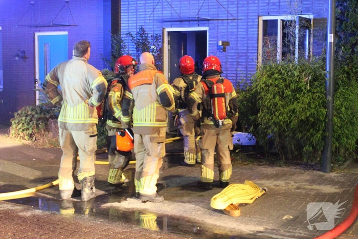 Buurman ontdekt brand in woning