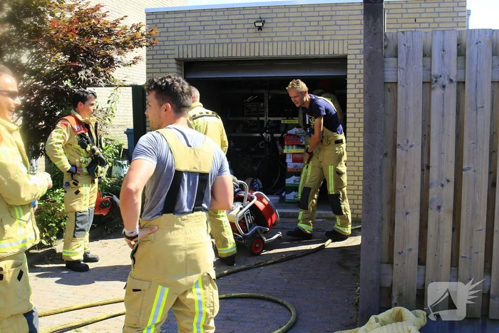 Brand in garage van woning