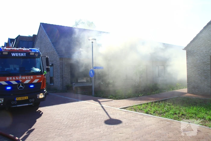 Hevige rookontwikkeling bij woningbrand