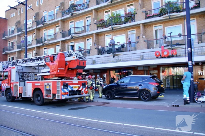 Bewoners vluchten naar dakterras bij brand