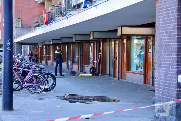 Bewoners vluchten naar dakterras bij brand