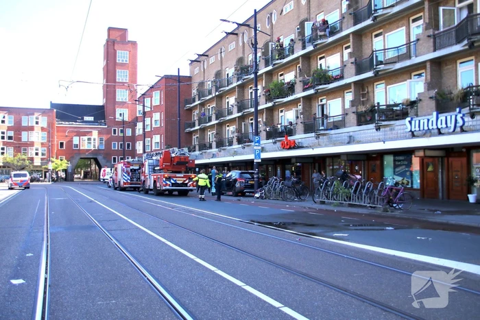 Bewoners vluchten naar dakterras bij brand