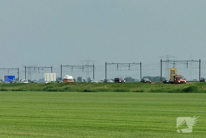 File na stilgevallen kraanwagen