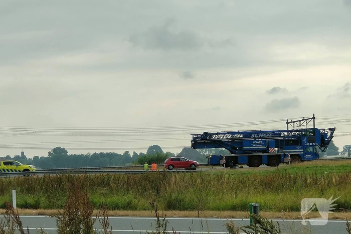 File na stilgevallen kraanwagen