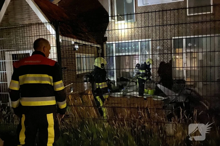 Tuinstoel in brand bij sloopwoning