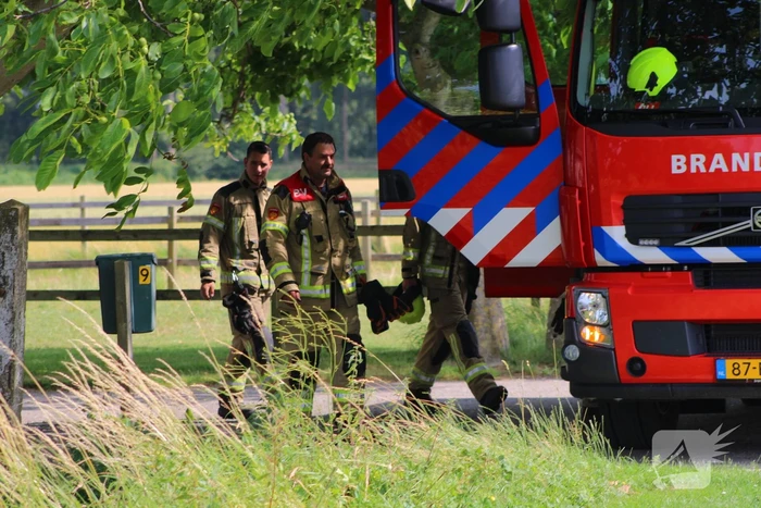 Brand in muur van schuur