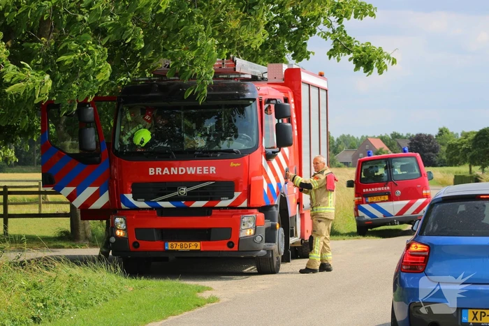 Brand in muur van schuur
