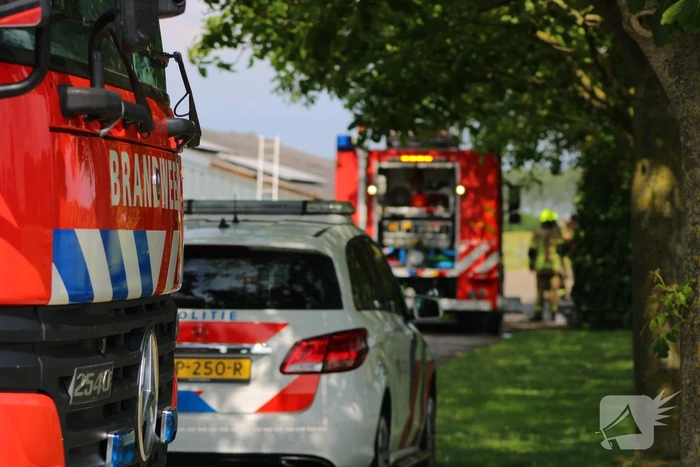 Brand in muur van schuur
