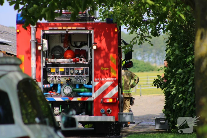 Brand in muur van schuur